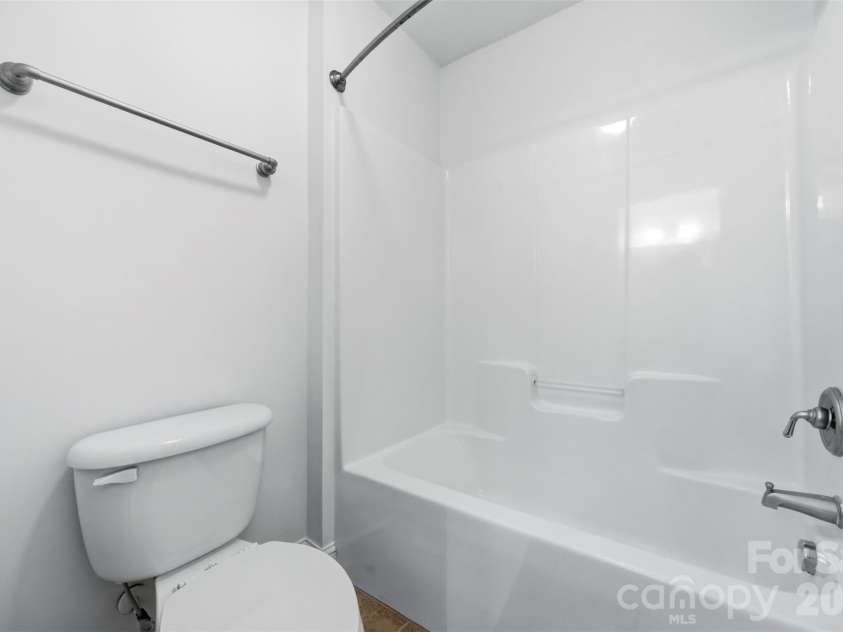 1703 Caddy Court, Matthews, NC 28104.  MLS# CAR4392423, YatesRealty ID 39056. Jack and Jill Bathroom