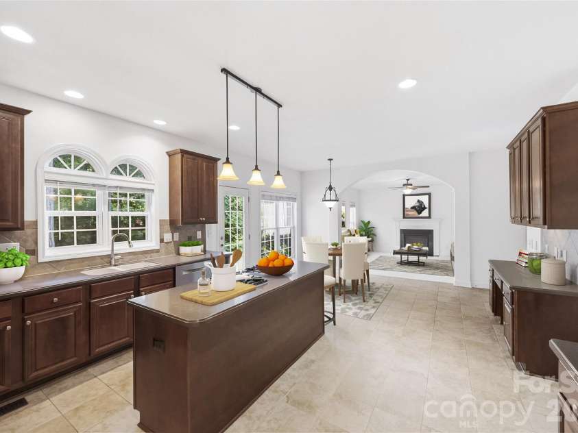 1703 Caddy Court, Matthews, NC 28104.  MLS# CAR4392423, YatesRealty ID 39056. Kitchen - Virtually Staged