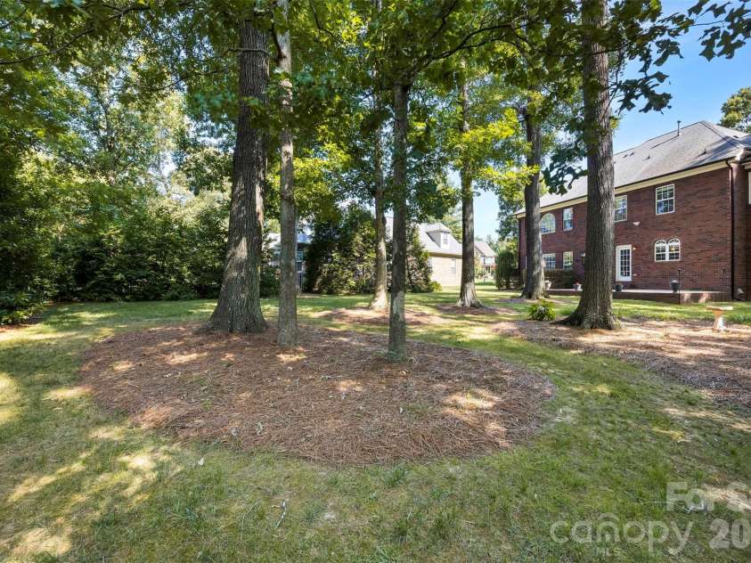 1703 Caddy Court, Matthews, NC 28104.  MLS# CAR4392423, YatesRealty ID 39056. Large Flat Backyard!