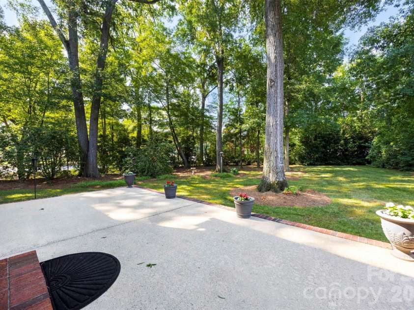 1703 Caddy Court, Matthews, NC 28104.  MLS# CAR4392423, YatesRealty ID 39056. Rear Patio