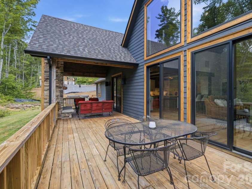 289 Linville River Drive, Linville, NC 28646.  MLS# CAR4405744, YatesRealty ID 39063. Large deck