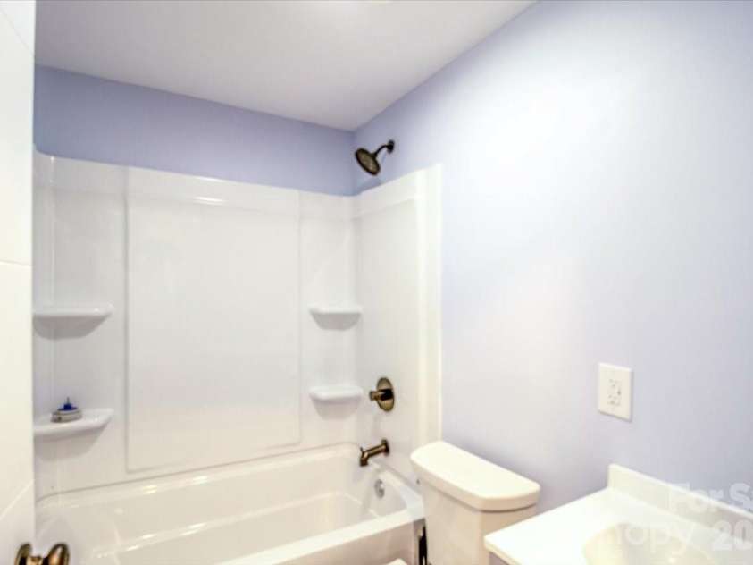2910 Old Highway 60 Highway, Ronda, NC 28670.  MLS# CAR4402333, YatesRealty ID 39064. Lower level Bathroom