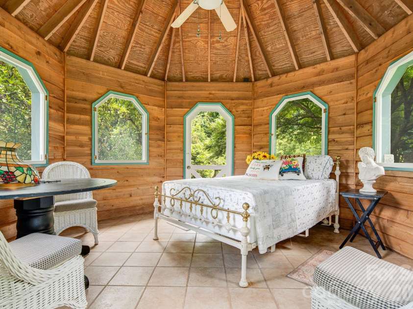 200 Black Hawk Trail, Waynesville, NC 28785.  MLS# CAR4404576, YatesRealty ID 39066. Inside Gazebo. Windows are screened in.