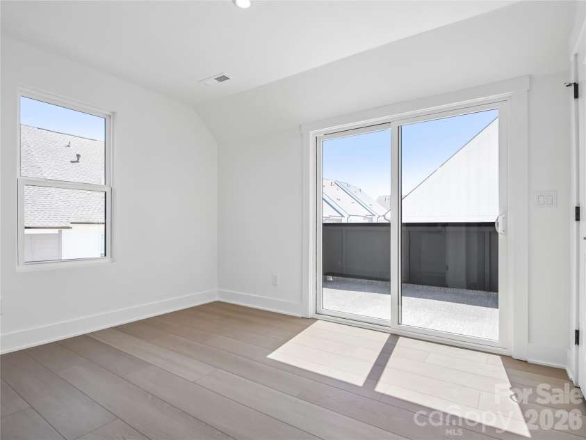4062 Sophia Drive, Charlotte, NC 28217.  MLS# CAR4368755, YatesRealty ID 39069. Fourth floor guest suite with rooftop access