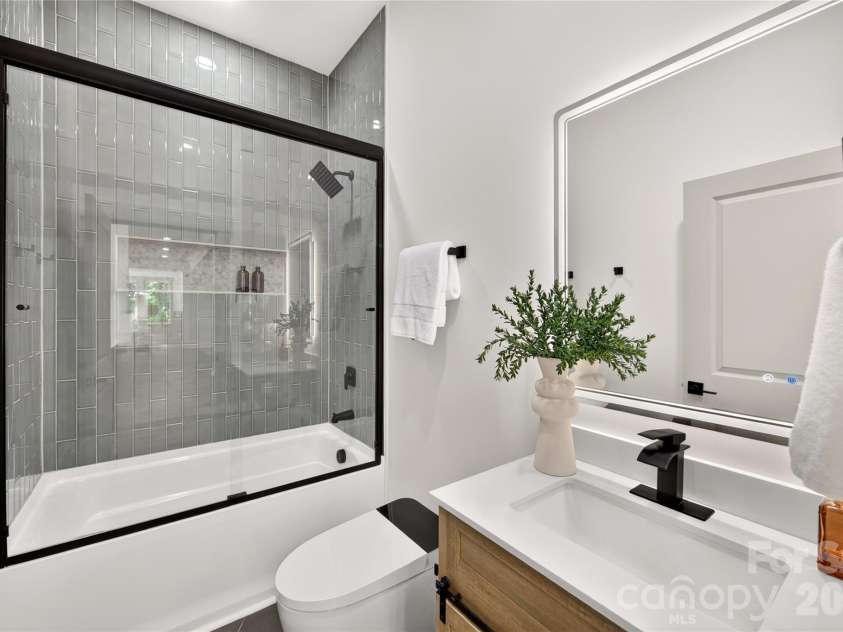 3141 Brayland Avenue, Matthews, NC 28104.  MLS# CAR4404701, YatesRealty ID 39075. Guest bath
