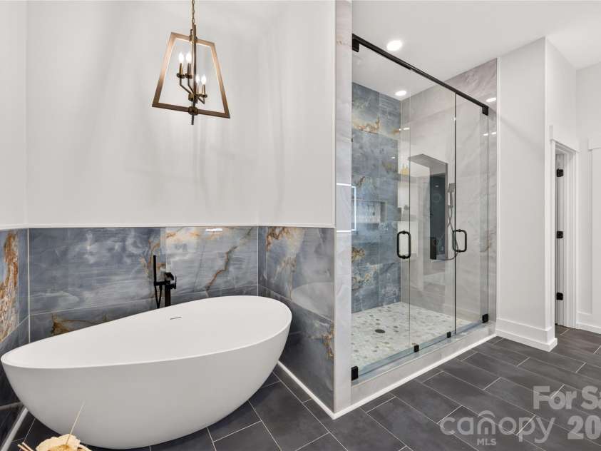 3141 Brayland Avenue, Matthews, NC 28104.  MLS# CAR4404701, YatesRealty ID 39075. Primary bath