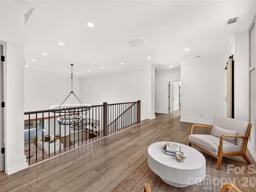 3141 Brayland Avenue, Matthews, NC 28104.  MLS# CAR4404701, YatesRealty ID 39075. Second level landing/Loft