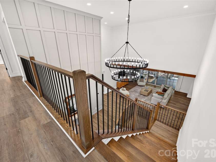 3141 Brayland Avenue, Matthews, NC 28104.  MLS# CAR4404701, YatesRealty ID 39075. Staircase to second level