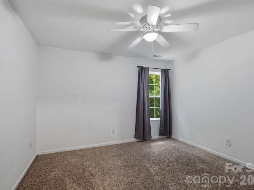 9153 Glenashley Drive, Cornelius, NC 28031.  MLS# CAR4397444, YatesRealty ID 39077. Back bedroom 2