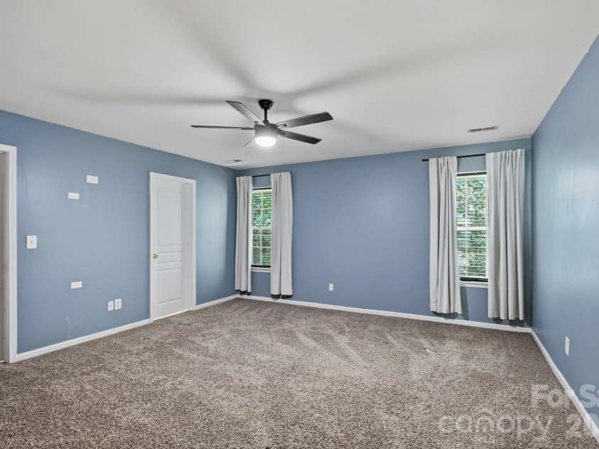 9153 Glenashley Drive, Cornelius, NC 28031.  MLS# CAR4397444, YatesRealty ID 39077. Primary bedroom