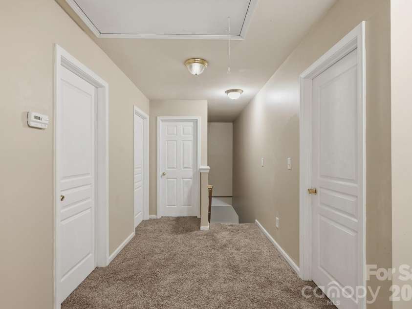 9153 Glenashley Drive, Cornelius, NC 28031.  MLS# CAR4397444, YatesRealty ID 39077. Upstairs hallway
