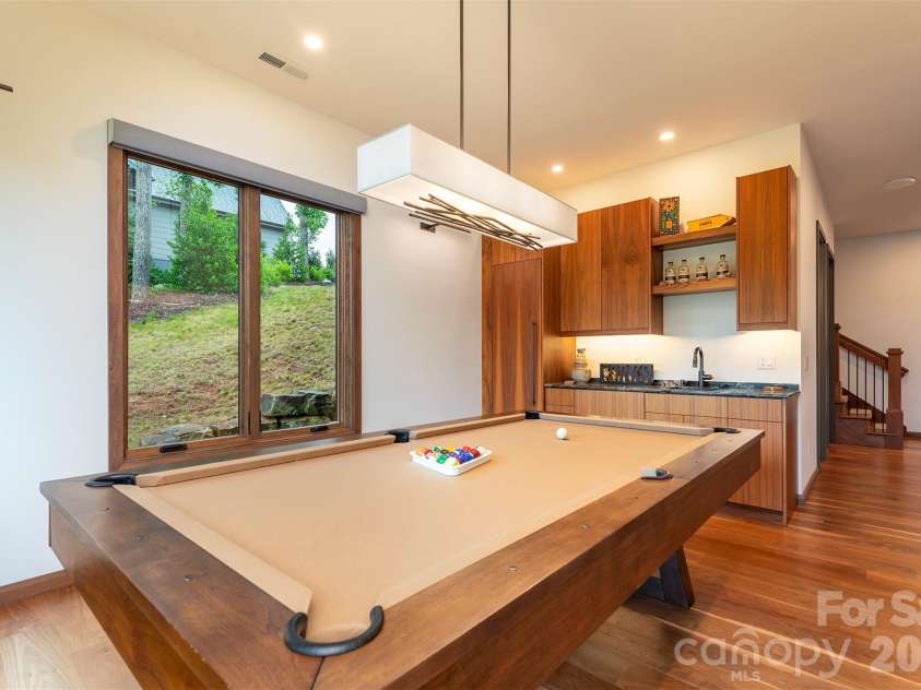 158 Riverbend Forest Drive, Asheville, NC 28805.  MLS# CAR4399646, YatesRealty ID 39092. Mini kitchen with pull out dishwasher and fridge/sink