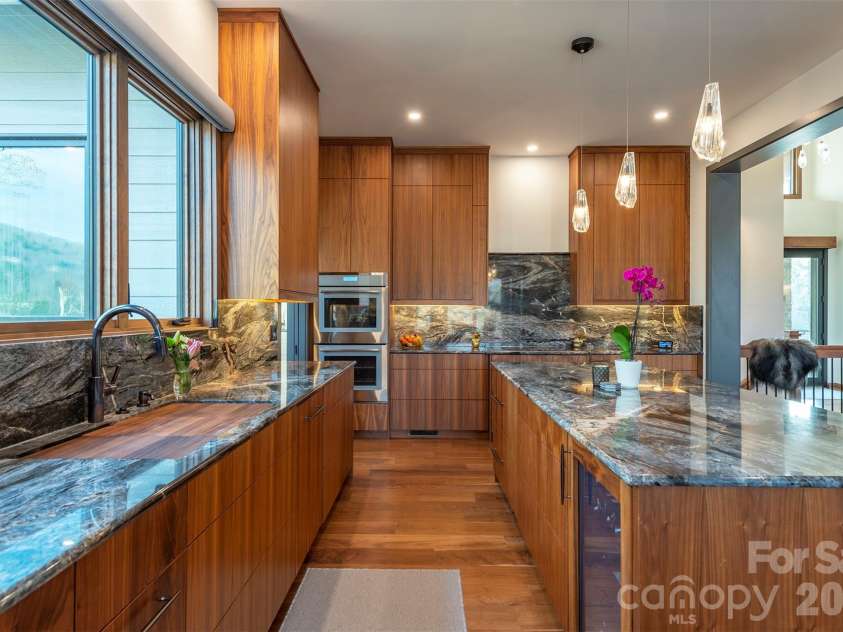 158 Riverbend Forest Drive, Asheville, NC 28805.  MLS# CAR4399646, YatesRealty ID 39092. Two small refridgerators and wine cooler