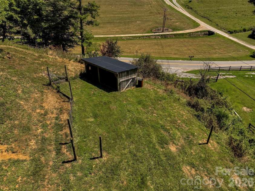 797 Pleasant Valley Road, Burnsville, NC 28714.  MLS# CAR4406248, YatesRealty ID 39102. 2 stall barn/shed