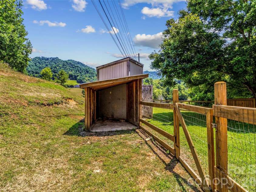797 Pleasant Valley Road, Burnsville, NC 28714.  MLS# CAR4406248, YatesRealty ID 39102. Storage sheds