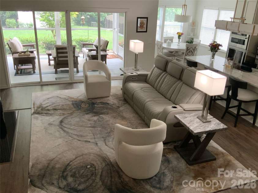5064 Stonehill Lane, Matthews, NC 28104.  MLS# CAR4405518, YatesRealty ID 39104. A good size Sectional Sofa fits nicely in this room