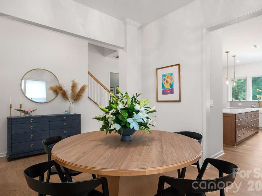 1042 Scotch Meadows Loop, Monroe, NC 28110.  MLS# CAR4404224, YatesRealty ID 39106. Dining into kitchen and great room