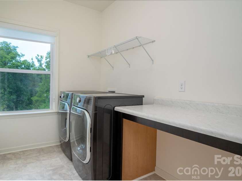 1042 Scotch Meadows Loop, Monroe, NC 28110.  MLS# CAR4404224, YatesRealty ID 39106. Full laundry room