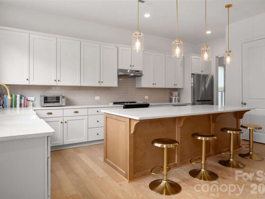 1042 Scotch Meadows Loop, Monroe, NC 28110.  MLS# CAR4404224, YatesRealty ID 39106. Kitchen storage