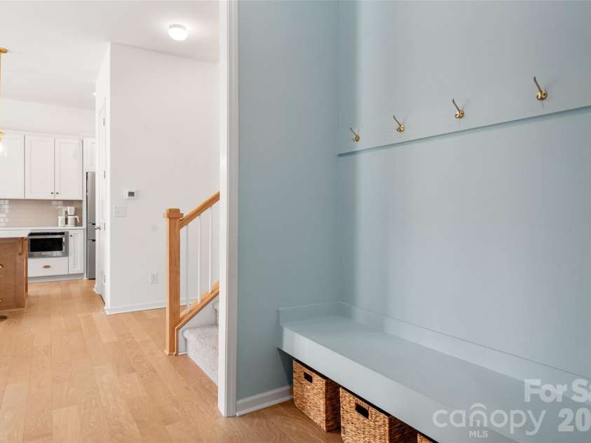 1042 Scotch Meadows Loop, Monroe, NC 28110.  MLS# CAR4404224, YatesRealty ID 39106. Mudroom hallway from garage