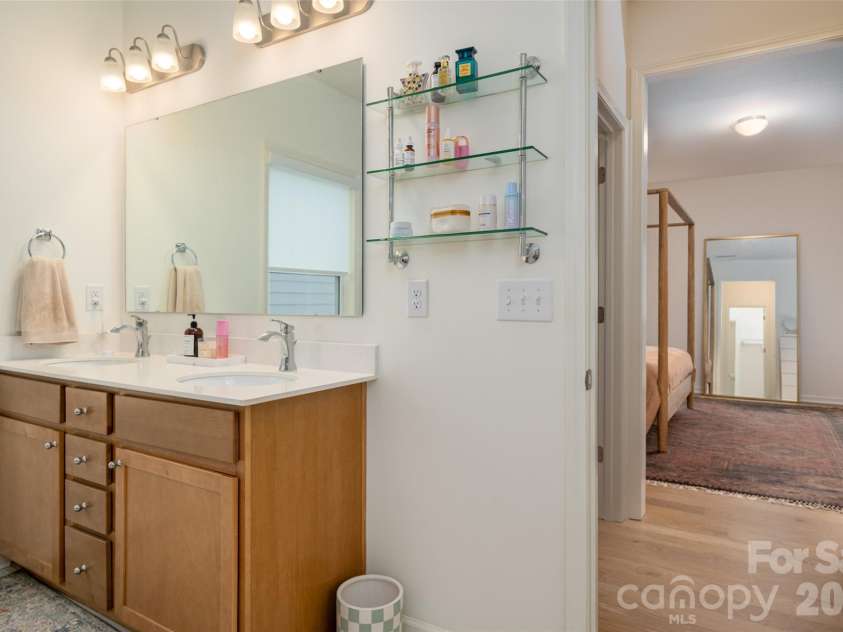 1042 Scotch Meadows Loop, Monroe, NC 28110.  MLS# CAR4404224, YatesRealty ID 39106. Primary's bath dual sinks