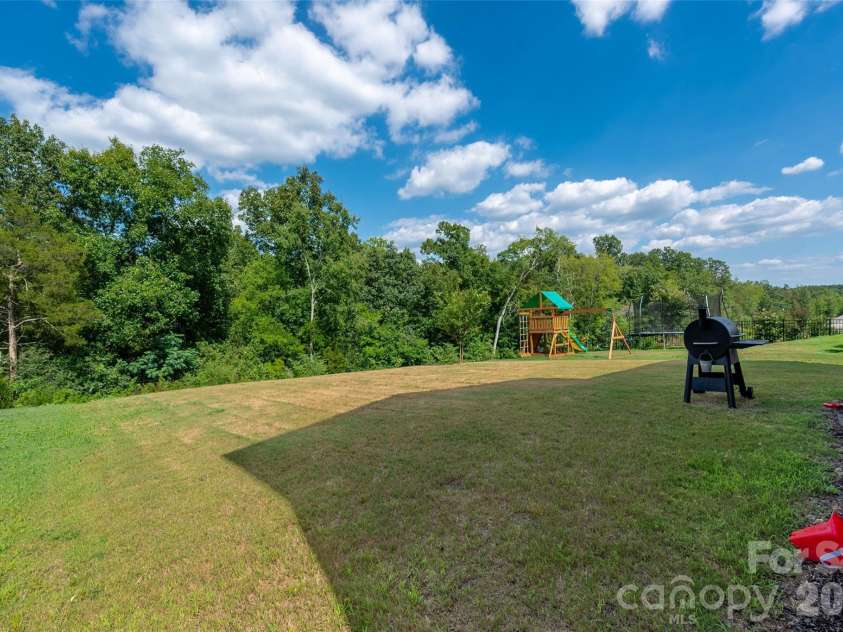 1042 Scotch Meadows Loop, Monroe, NC 28110.  MLS# CAR4404224, YatesRealty ID 39106. Private rear