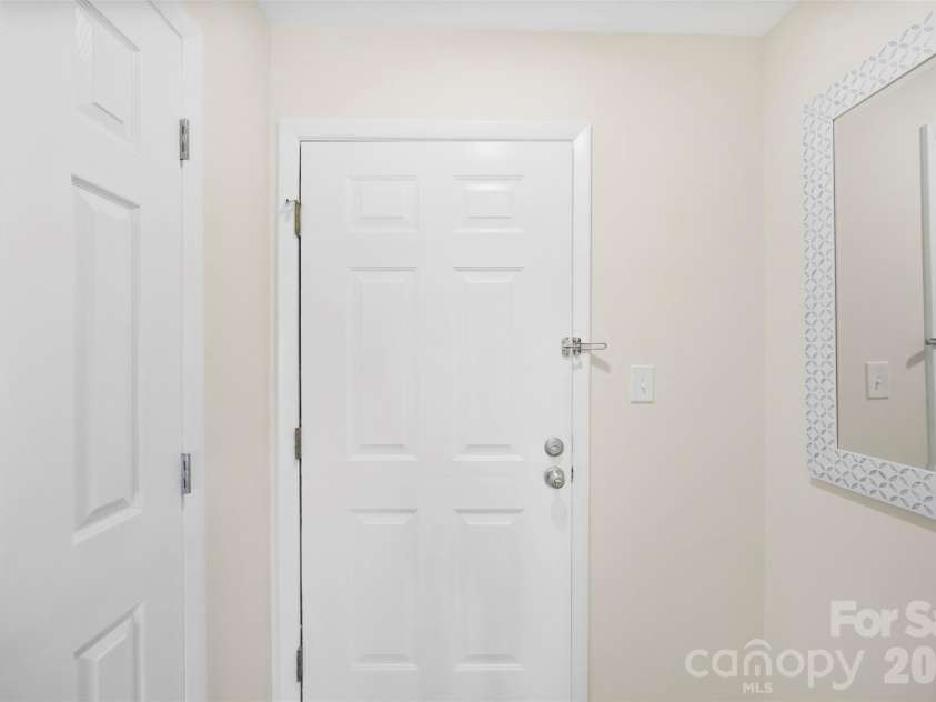 9808 Emerald Point Drive, Charlotte, NC 28278.  MLS# CAR4393895, YatesRealty ID 39108. Front Door with Drop Space to the right