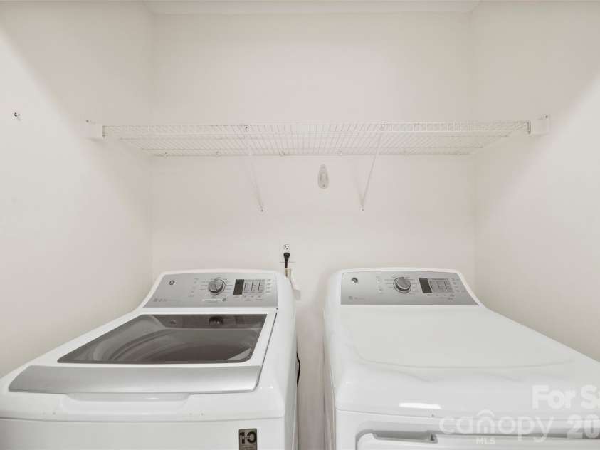 9808 Emerald Point Drive, Charlotte, NC 28278.  MLS# CAR4393895, YatesRealty ID 39108. Laundry full size washer dryer