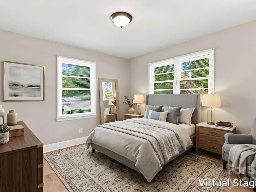 3708 Carlyle Drive, Charlotte, NC 28208.  MLS# CAR4405465, YatesRealty ID 39109. Walking into the primary bedroom (virtually staged & enhanced).