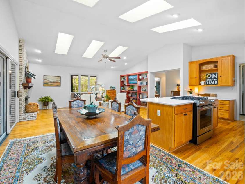 33 Ugedaliyvi Court, Brevard, NC 28712.  MLS# CAR4349656, YatesRealty ID 3911. Large dining area with room for a side board 
