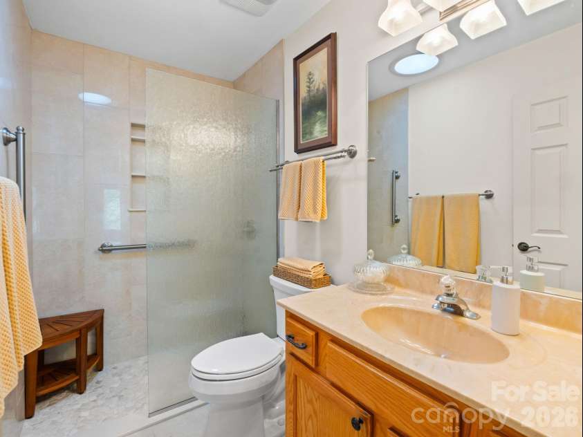33 Ugedaliyvi Court, Brevard, NC 28712.  MLS# CAR4349656, YatesRealty ID 3911. Second bath with walk-in shower