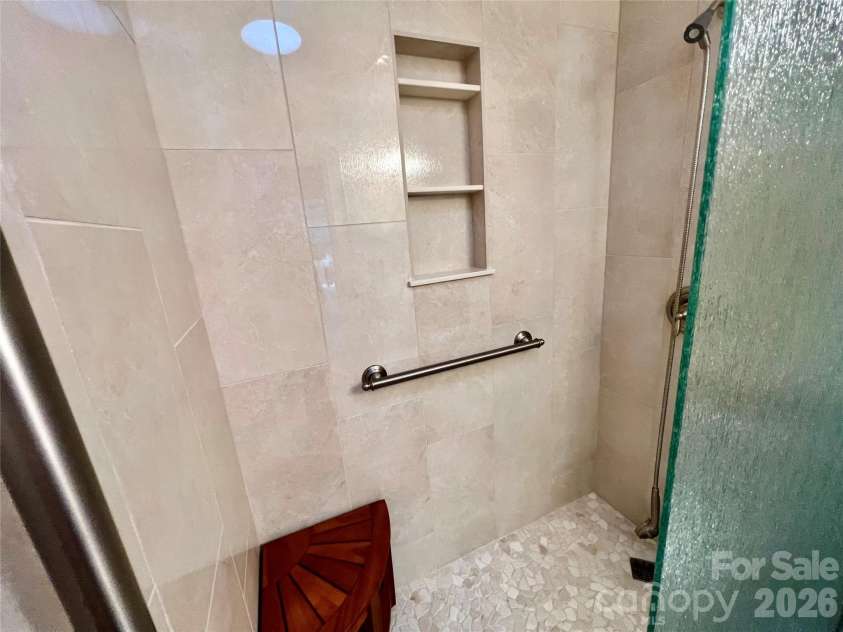 33 Ugedaliyvi Court, Brevard, NC 28712.  MLS# CAR4349656, YatesRealty ID 3911. Tasteful, custom tile 