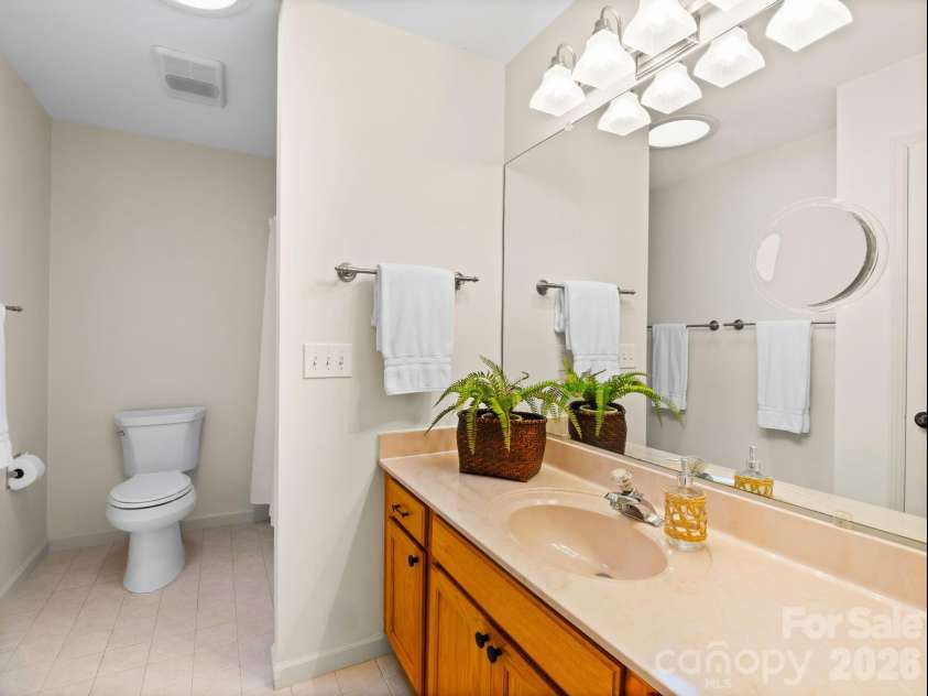 33 Ugedaliyvi Court, Brevard, NC 28712.  MLS# CAR4349656, YatesRealty ID 3911. Third full bath delivers a tub / shower combo