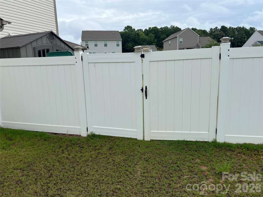 714 Lexington Drive, Albemarle, NC 28001.  MLS# CAR4402984, YatesRealty ID 39111. Gate to backyard