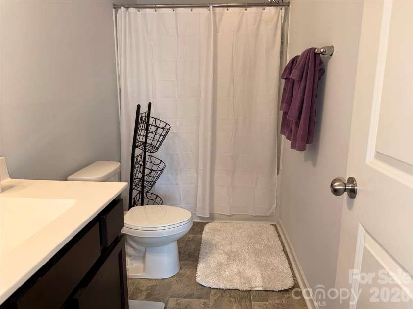 714 Lexington Drive, Albemarle, NC 28001.  MLS# CAR4402984, YatesRealty ID 39111. Second floor bathroom