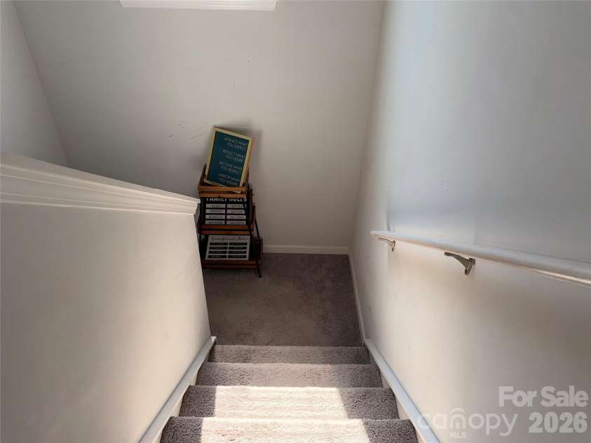 714 Lexington Drive, Albemarle, NC 28001.  MLS# CAR4402984, YatesRealty ID 39111. Stairs going down