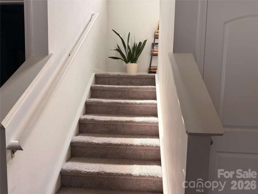714 Lexington Drive, Albemarle, NC 28001.  MLS# CAR4402984, YatesRealty ID 39111. Stairs going up