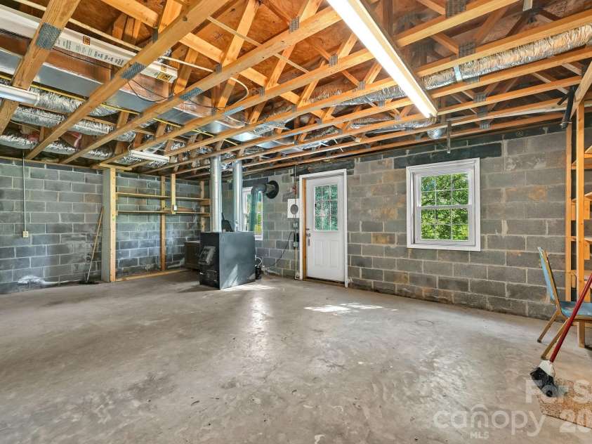 553 Morgan Branch Road, Marshall, NC 28753.  MLS# CAR4400698, YatesRealty ID 39114. Basement/Workshop Area