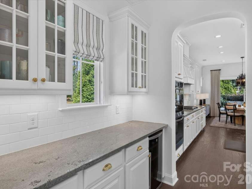 971 Castlewatch Drive, Fort Mill, SC 29708.  MLS# CAR4402359, YatesRealty ID 39121. Butlers pantry flows to kitchen