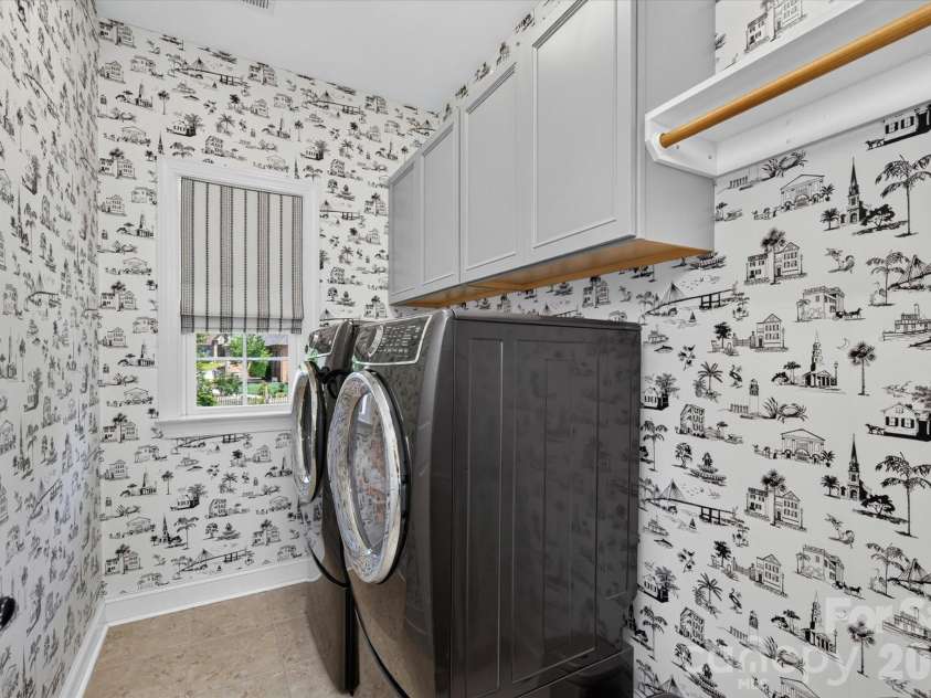 971 Castlewatch Drive, Fort Mill, SC 29708.  MLS# CAR4402359, YatesRealty ID 39121. Laundry room with millwork upstairs