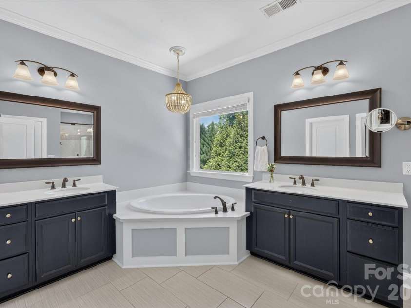 971 Castlewatch Drive, Fort Mill, SC 29708.  MLS# CAR4402359, YatesRealty ID 39121. Primary bath with dual vanities