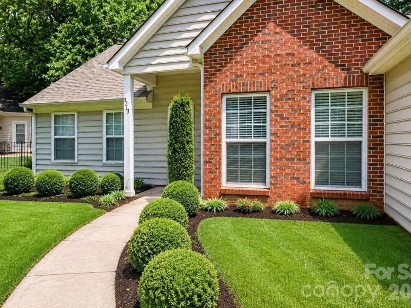 6213 Nevin Road, Charlotte, NC 28262.  MLS# CAR4363288, YatesRealty ID 39124. Digitally enhanced; grass virtually added