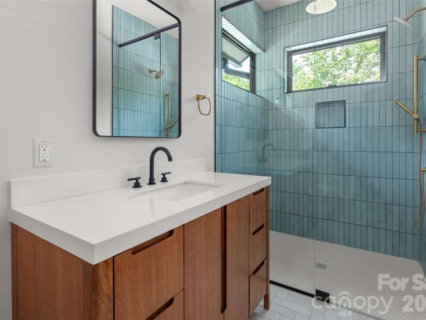 93 Village Pointe Lane, Asheville, NC 28803.  MLS# CAR4399608, YatesRealty ID 39127. Main floor secondary en suite