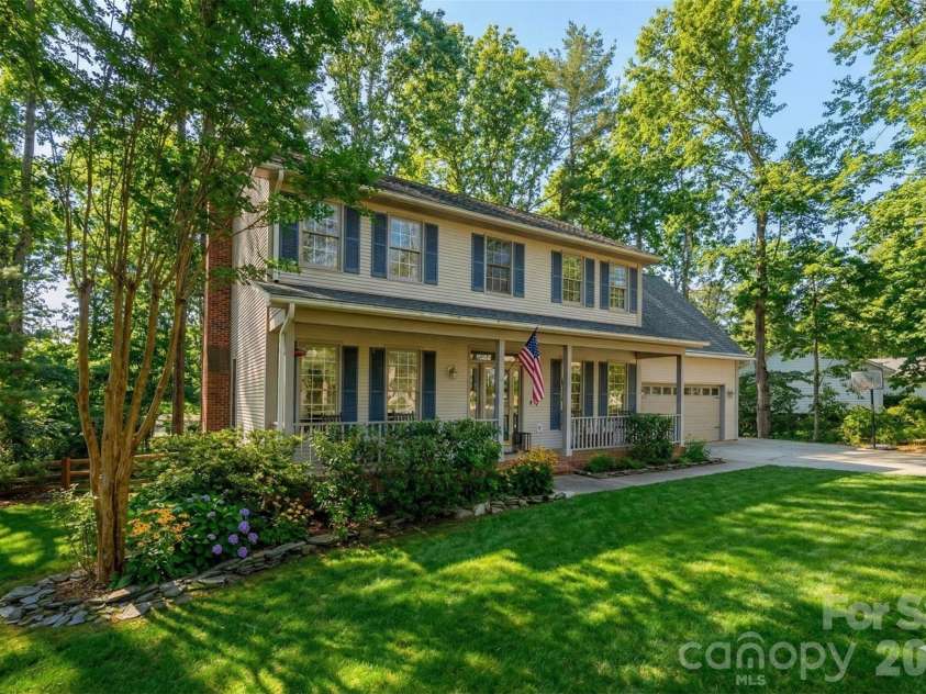 242 Windsor Forest Circle, Fletcher, NC 28732.  MLS# CAR4354358, YatesRealty ID 3913. Virtually enhanced to show green grass and lush trees. 