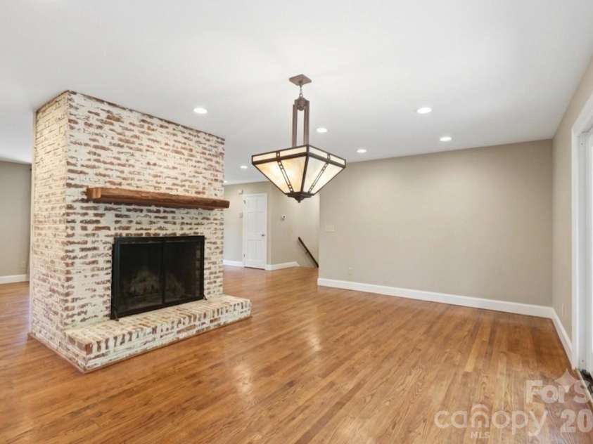 2620 Lynbridge Drive, Charlotte, NC 28226.  MLS# CAR4396076, YatesRealty ID 39131. AI emptied main level FP