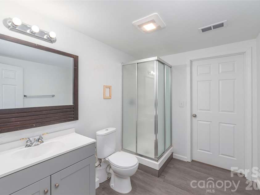 5 Declan Drive, Weaverville, NC 28787.  MLS# CAR4367979, YatesRealty ID 39137. Lower Level Bathroom