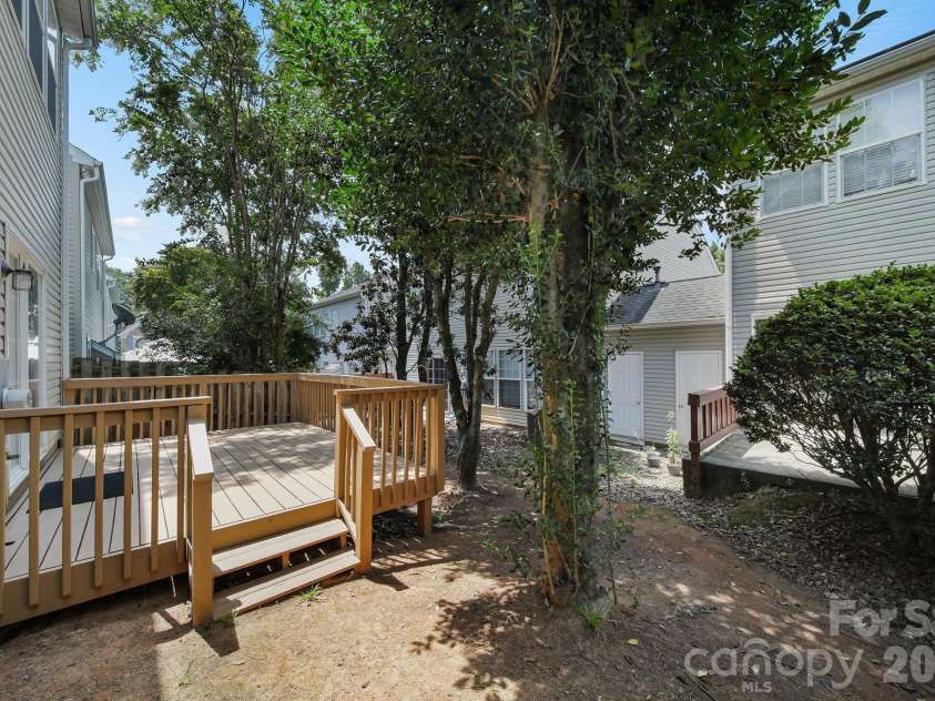 11719 Woodmere Trace Drive, Charlotte, NC 28277.  MLS# CAR4406102, YatesRealty ID 39139. Deck and Storage Unit