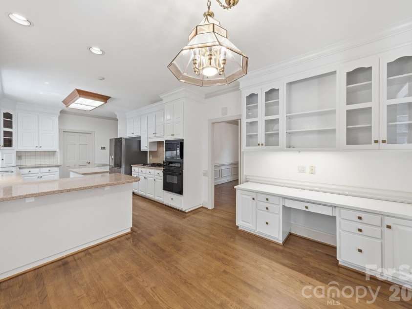 5215 Silchester Lane, Charlotte, NC 28215.  MLS# CAR4361255, YatesRealty ID 39146. Freshly painted cabinets with new modern knobs & pulls.