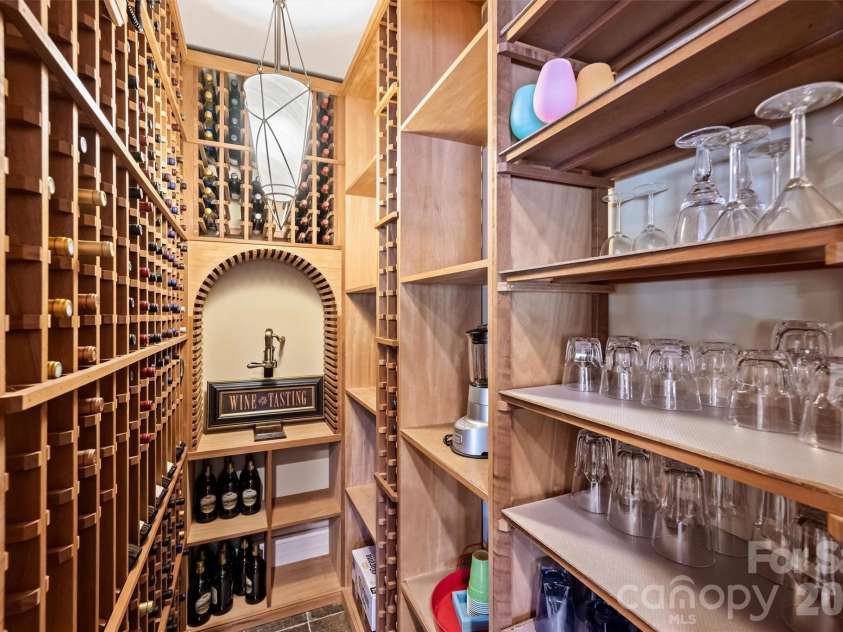 11717 Smart Lane, Charlotte, NC 28277.  MLS# CAR4403907, YatesRealty ID 39154. 600 bottle wine cellar