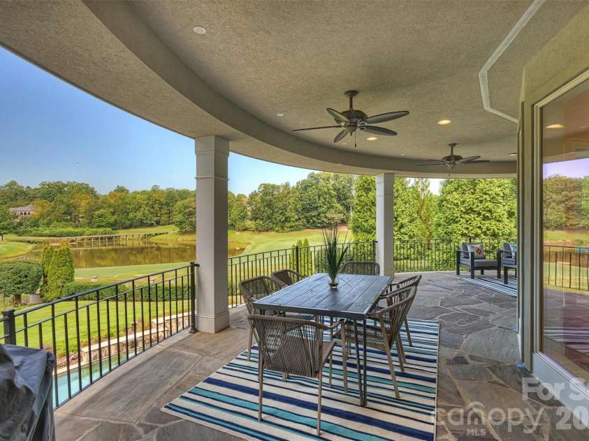 11717 Smart Lane, Charlotte, NC 28277.  MLS# CAR4403907, YatesRealty ID 39154. Expansive and magnificent curved terrace with views all around